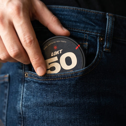 A LOKT 50 can slipped into the coin pocket of a pair of jeans