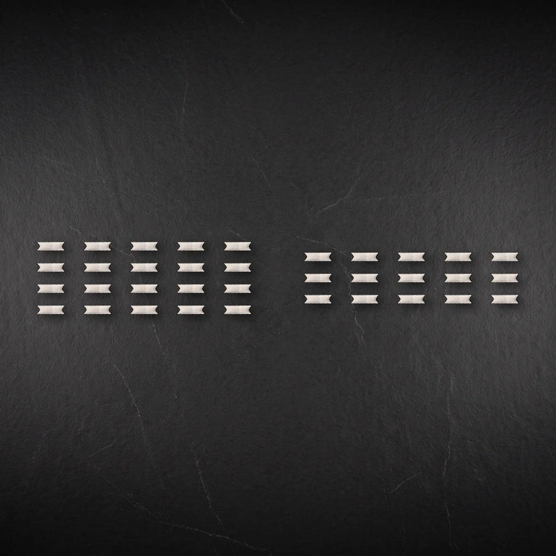 Twenty LOKT 50 pouches beside a typical fifteen-count layout