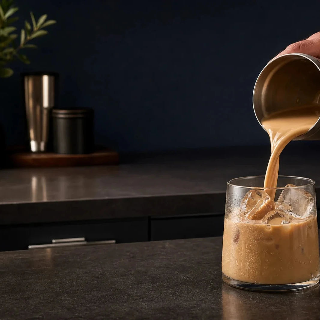 LOKT MIX Original Latte poured from a shaker over ice