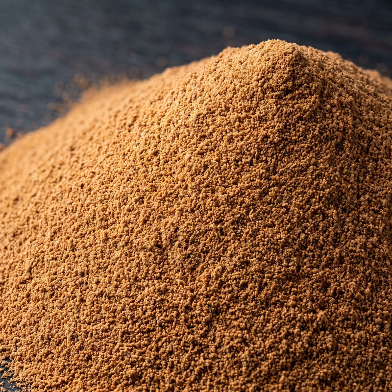 Close macro of LOKT MIX Original Latte protein coffee powder, showing the grind