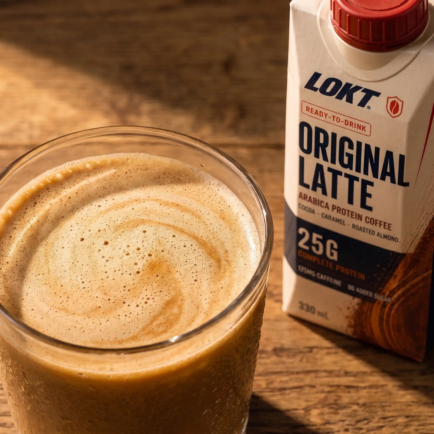 Close view of the LOKT READY Original Latte crema and drink texture