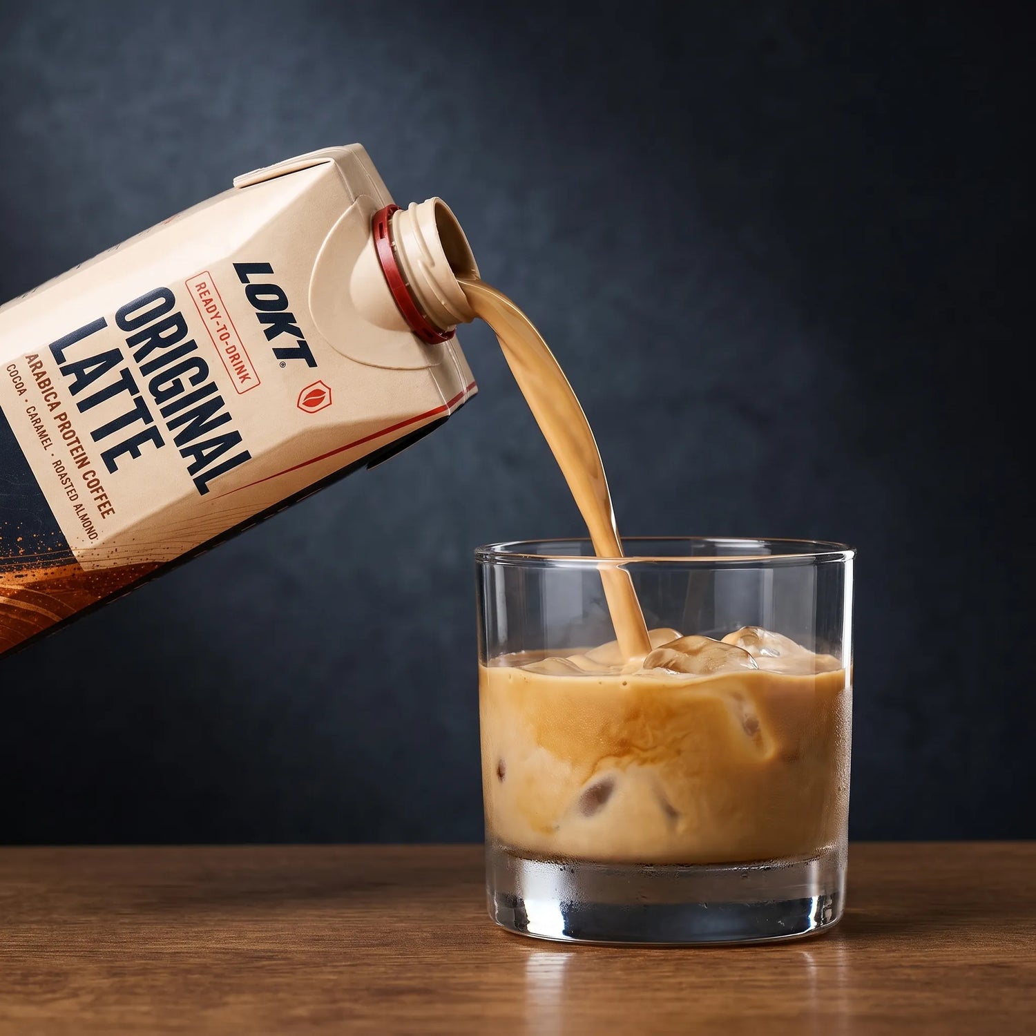 LOKT READY Original Latte being poured into a glass over ice