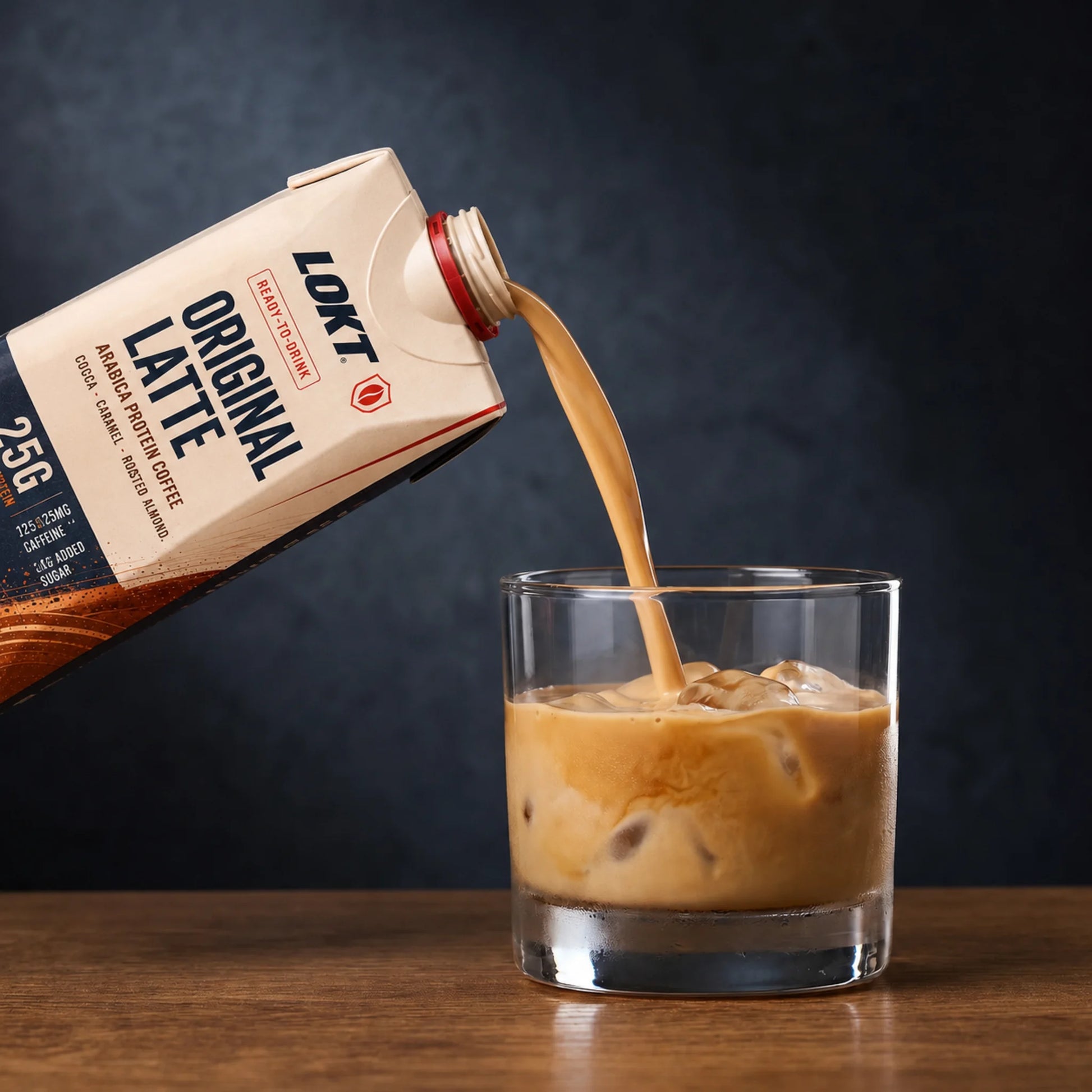 LOKT READY Original Latte being poured into a glass over ice